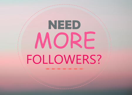 Need more followers word on pink backgroundの写真素材