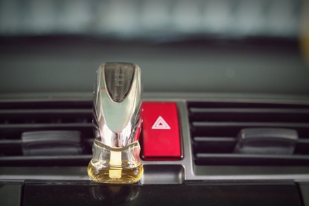 emergency button in car and air conditioned perfumeの写真素材