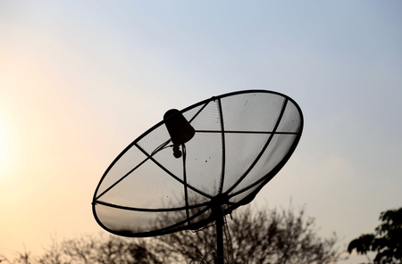 Satellite TV on the roof of rural house in Thailandの写真素材