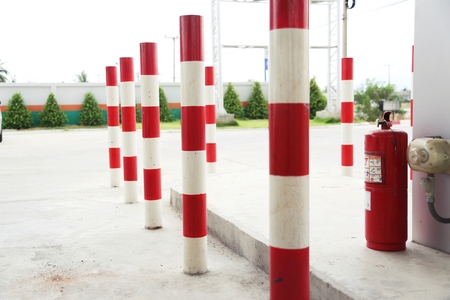emergency pillar paint red and white in LPG stationの写真素材
