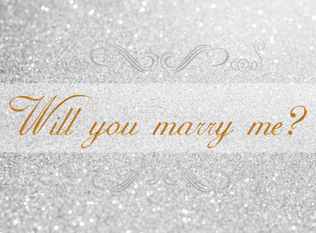 will you marry me? on white silver glitter bokeh abstract backgroundの写真素材