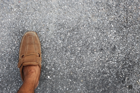 concrete floor texture with men shoesの写真素材