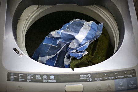 clothes are not wash in washing machineの写真素材
