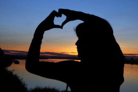 Teenager playing on sunset timeの写真素材