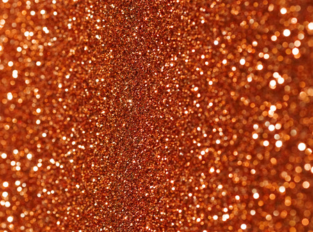 orange glitter bokeh abstract backgroundの写真素材
