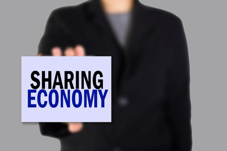 Modern business background concept with word: SHARING ECONOMYの写真素材