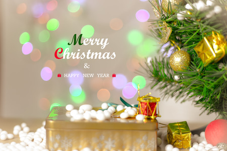 Gift boxes and ornaments in Merry Christmas and Happy New Year concept with bokeh background, can be use for make a greeting cards.の写真素材