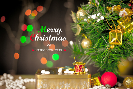 Gift boxes and ornaments in Merry Christmas and Happy New Year concept with bokeh background, can be use for make a greeting cards.の写真素材