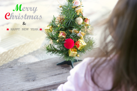 Gift boxes and ornaments in Merry Christmas and Happy New Year concept with bokeh background, can be use for make a greeting cards.の写真素材