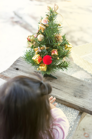 Gift boxes and ornaments in Merry Christmas and Happy New Year concept with bokeh background, can be use for make a greeting cards.の写真素材