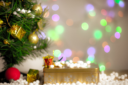 Gift boxes and ornaments in Merry Christmas and Happy New Year concept with bokeh background, can be use for make a greeting cards.の写真素材