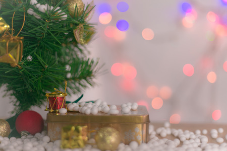 Gift boxes and ornaments in Merry Christmas and Happy New Year concept with bokeh background, can be use for make a greeting cards.の写真素材