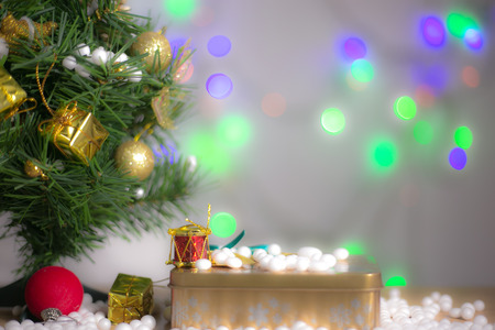 Gift boxes and ornaments in Merry Christmas and Happy New Year concept with bokeh background, can be use for make a greeting cards.の写真素材