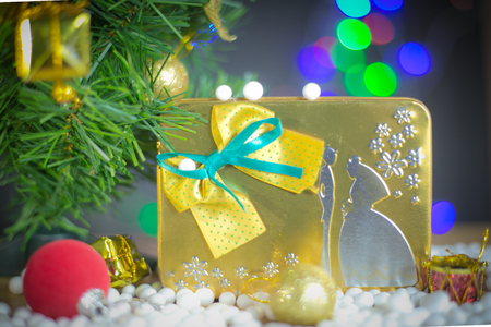 Gift boxes and ornaments in Merry Christmas and Happy New Year concept with bokeh background, can be use for make a greeting cards.の写真素材