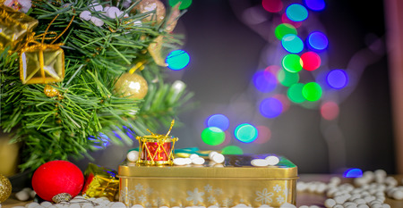 Gift boxes and ornaments in Merry Christmas and Happy New Year concept with bokeh background, can be use for make a greeting cards.の写真素材