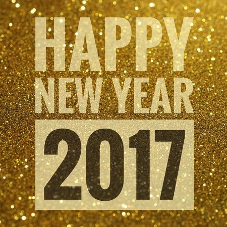 Happy new year 2017 words on shiny glitter backgroundの写真素材