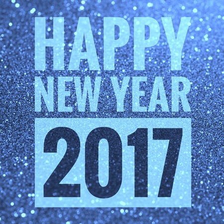 Happy new year 2017 words on shiny glitter backgroundの写真素材