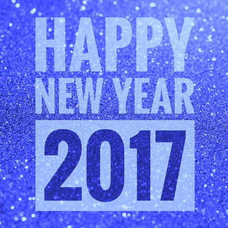 Happy new year 2017 words on shiny glitter backgroundの写真素材