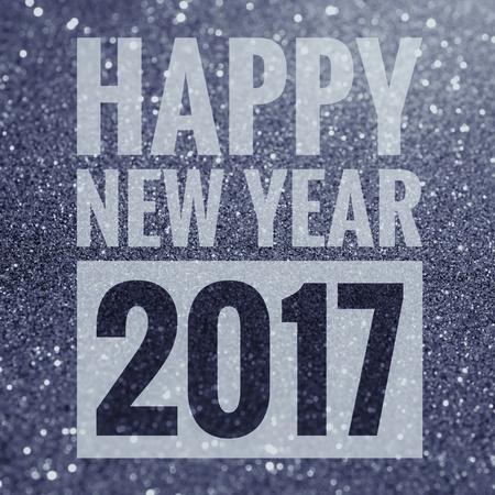 Happy new year 2017 words on shiny glitter backgroundの写真素材