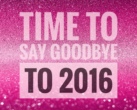 Time to say goodbye to 2016 on shiny glitter backgroundの写真素材