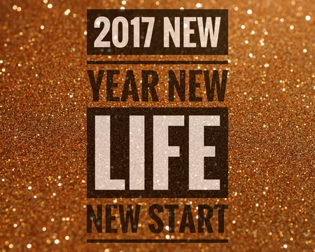 Happy new year 2017 words on shiny gold glitter backgroundの写真素材