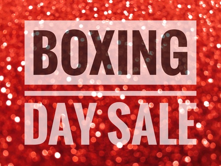 Boxing Day sale words on shiny red glitter backgroundの写真素材