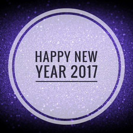 Happy new year 2017 words on shiny purple and blue glitter backgroundの写真素材
