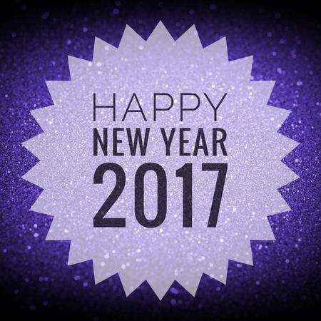 Happy new year 2017 words on shiny purple and blue glitter background