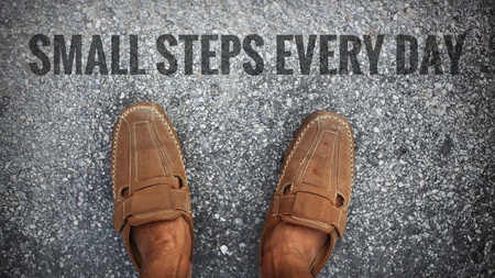 Small steps every day words on Man standing on the streetの写真素材