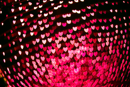 Pink and red heart bokeh abstract background