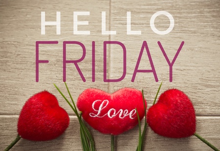 Hello Friday words on red heart and wooden backgroundの写真素材