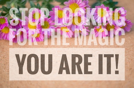 Stop looking for the magic you are it! words on pink and wooden background.の写真素材