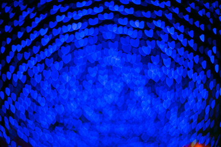 Blue heart bokeh abstract background from night light Chinese new year festival.の写真素材