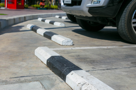 Close up of parking places front of toilet in oil gas station.の写真素材