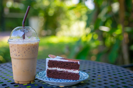 Iced coffee with cake in the morning.の写真素材