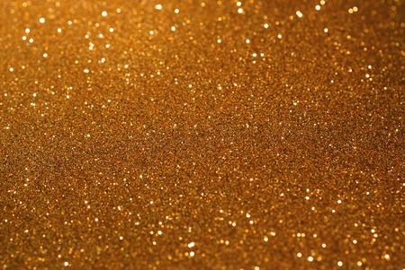 Gold copper glitter bokeh texture abstract backgroundの写真素材