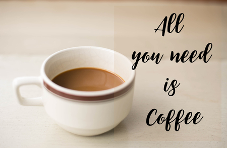 All you need is coffee words on cup of coffee on the table.の写真素材