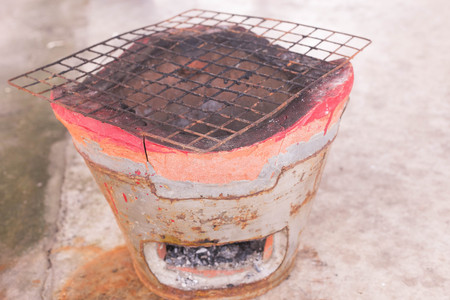 Empty charcoal stove, can be use for burning or grill food.の写真素材