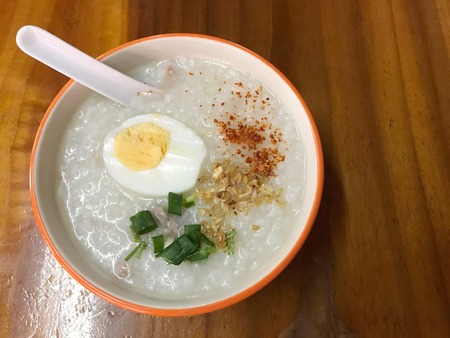 Rice Porridge in the bowl, soft boiled rice in pork soup.の写真素材