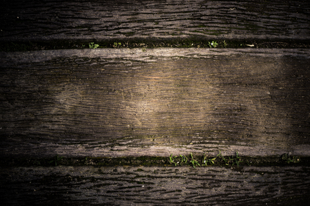 Dark brown and black wooden wall for background.の写真素材