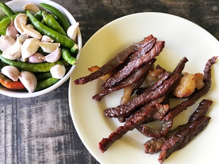 Fried Dried beef good with sticky rice, Thai food.の写真素材