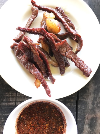Fried Dried beef good with sticky rice, Thai food.の写真素材