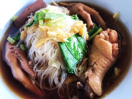 Braised chicken soup with bitter gourd noodle.