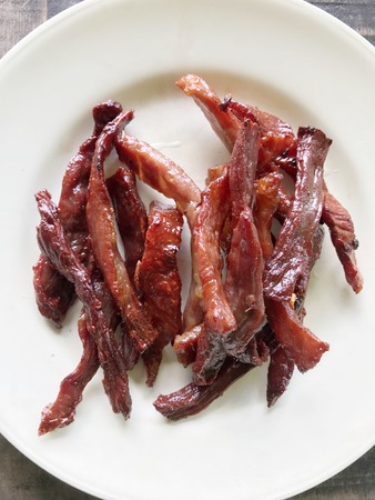 Fried Dried beef good with sticky rice, Thai foodの写真素材