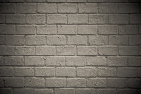 Old grey brick wall.background, Abstract geometric white texture brick on the wall.の写真素材