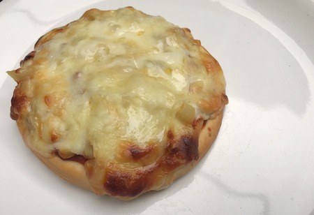 homemade pizza full of cheeseの写真素材