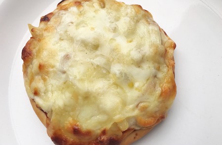 homemade pizza full of cheeseの写真素材