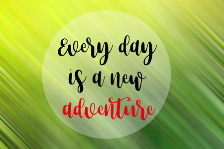 Every day is a new adventure words on green blurred image, motivational life quote.の写真素材