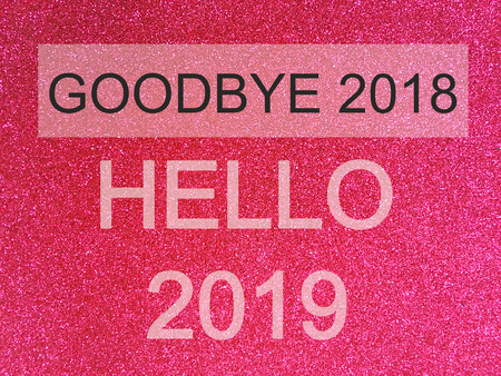 Goodbye 2018 Hello 2019, loading New Year words on Pink glitter texture Christmas abstract background.の写真素材