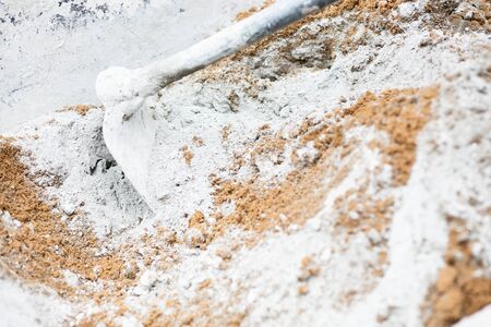 Worker labor, Mixer operator building staircase with concrete cement and brick at construction site.の写真素材